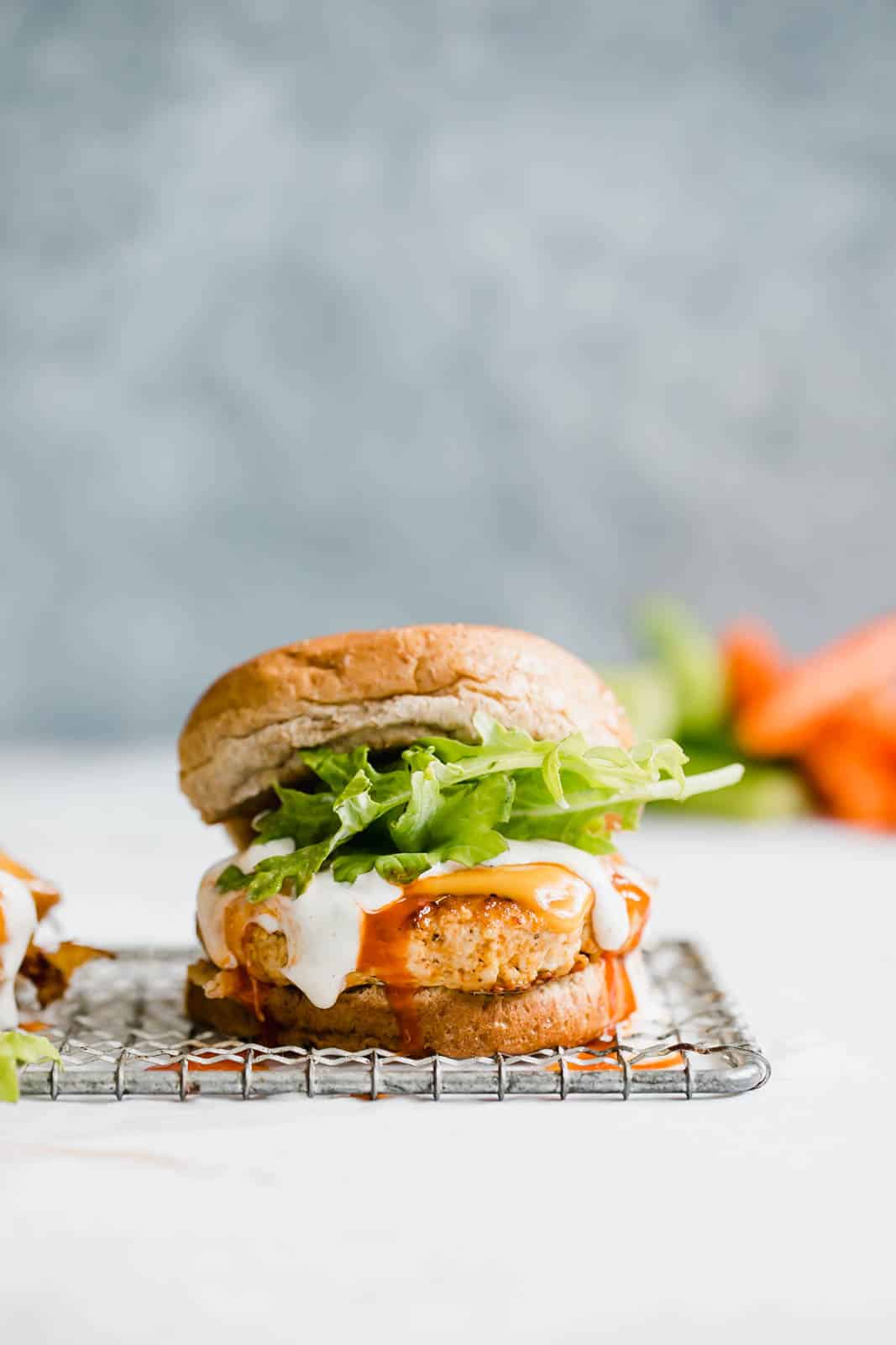 buffalo chicken burgers I howsweeteats.com #buffalo #chicken #burgers