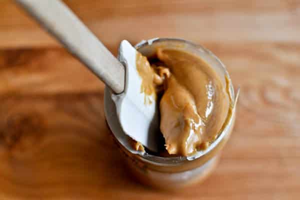 These are perfect peanut butter blossoms! My favorite cookie at christmastime has always been classic peanut butter blossoms and my grandma had the recipe nailed. These are super easy, delicious and will make a lot of cookies! I howsweeteats.com #peanutbutter #blossoms