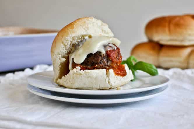 Cheesy Stuffed Meatball Sliders I howsweeteats.com Cheesy Stuffed Meatball Sliders I howsweeteats.com