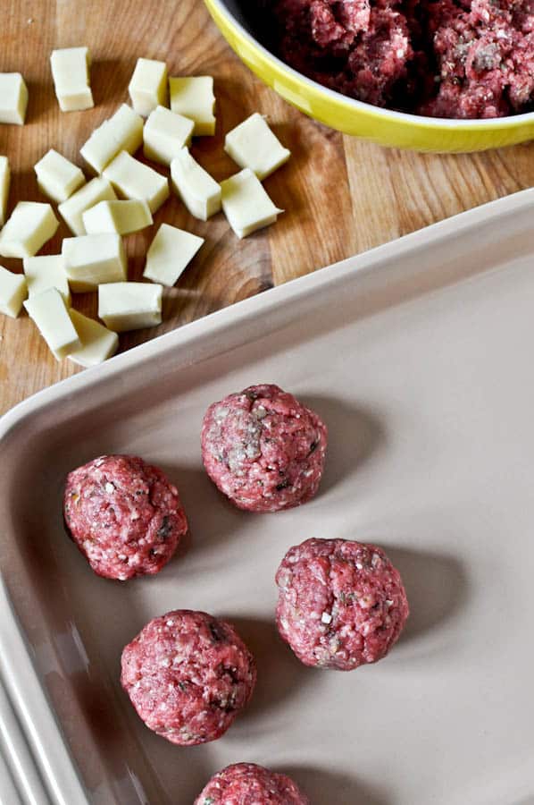 Cheesy Stuffed Meatball Sliders I howsweeteats.com Cheesy Stuffed Meatball Sliders I howsweeteats.com