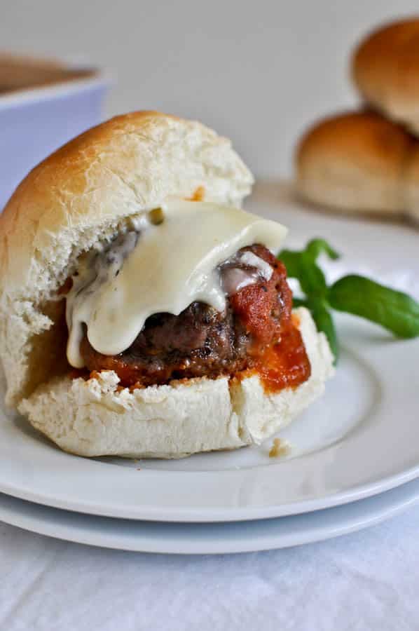Cheesy Stuffed Meatball Sliders I howsweeteats.com Cheesy Stuffed Meatball Sliders I howsweeteats.com