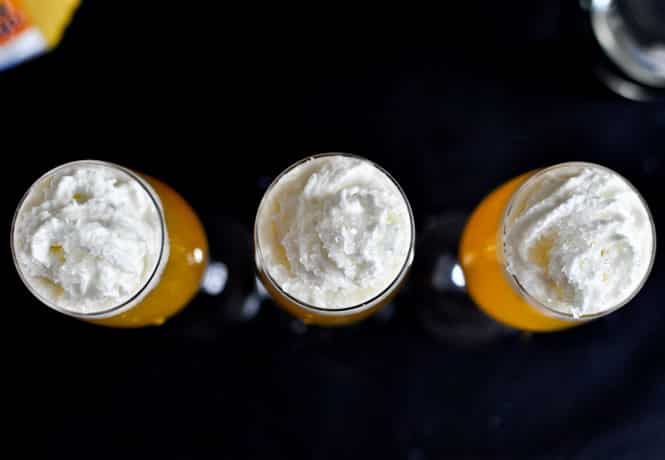 Creamsicle Mimosas I howsweeteats.com Creamsicle Mimosas I howsweeteats.com