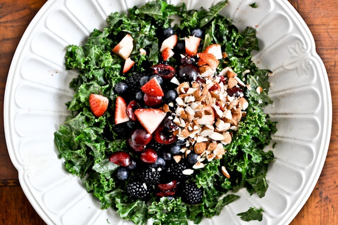 Triple Berry Kale Salad with Fresh Strawberry Vinaigrette I howsweeteats.com Triple Berry Kale Salad with Fresh Strawberry Vinaigrette I howsweeteats.com