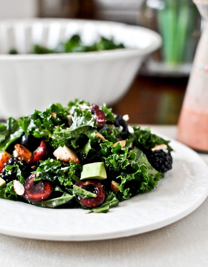 Triple Berry Kale Salad with Fresh Strawberry Vinaigrette I howsweeteats.com Triple Berry Kale Salad with Fresh Strawberry Vinaigrette I howsweeteats.com