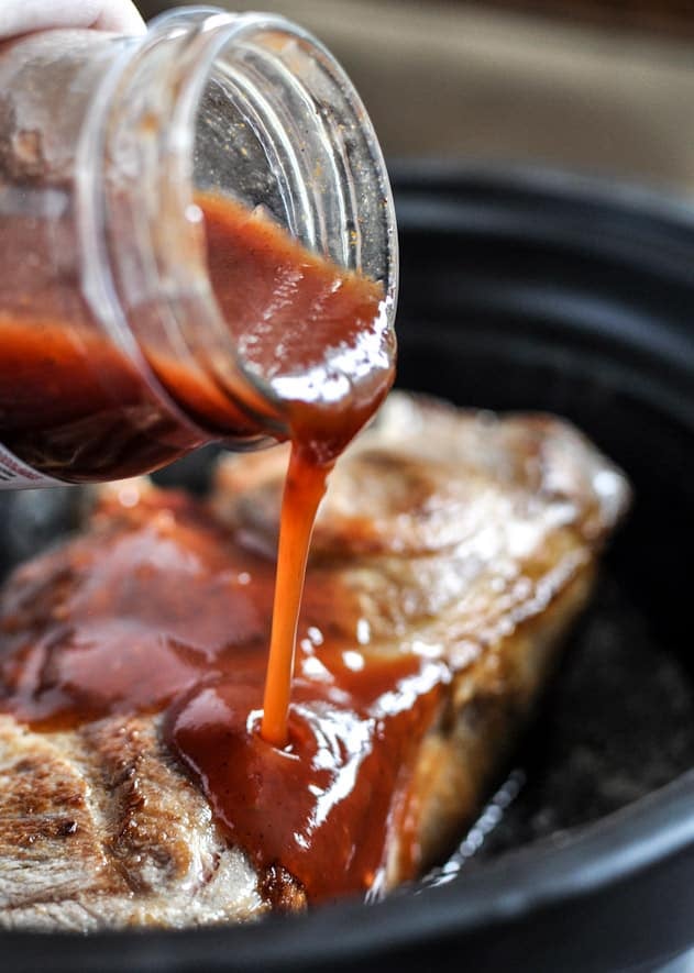 Crockpot BBQ Beer Pulled Pork Tacos with Crispy Onion Straws and Mango Salsa I howsweeteats.com Crockpot BBQ Beer Pulled Pork Tacos with Crispy Onion Straws and Mango Salsa I howsweeteats.com