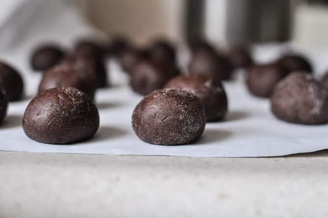 Glazed and Sprinkled Chocolate Cake Donut Holes I howsweeteats.com Glazed and Sprinkled Chocolate Cake Donut Holes I howsweeteats.com