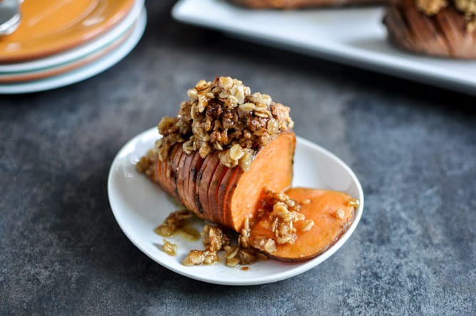 Cinnamon Sugar Hasselback Sweet Potatoes with Oatmeal Cookie Crumble I howsweeteats.com Cinnamon Sugar Hasselback Sweet Potatoes with Oatmeal Cookie Crumble I howsweeteats.com