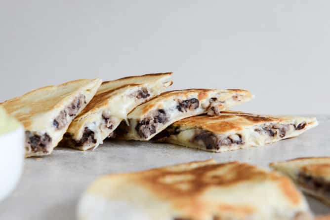 Cheesy Double Bean Quesadillas with Homemade Avocado Ranch I howsweeteats.com Cheesy Double Bean Quesadillas with Homemade Avocado Ranch I howsweeteats.com