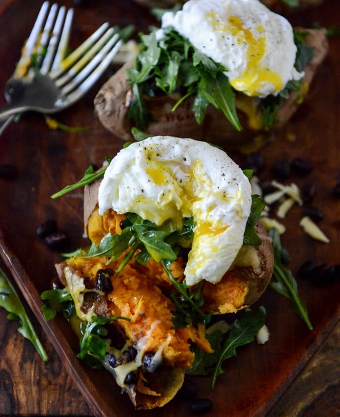 Cheesy Black Bean Stuffed Sweet Potatoes with Arugula + Poached Eggs I howsweeteats.com Cheesy Black Bean Stuffed Sweet Potatoes with Arugula + Poached Eggs I howsweeteats.com