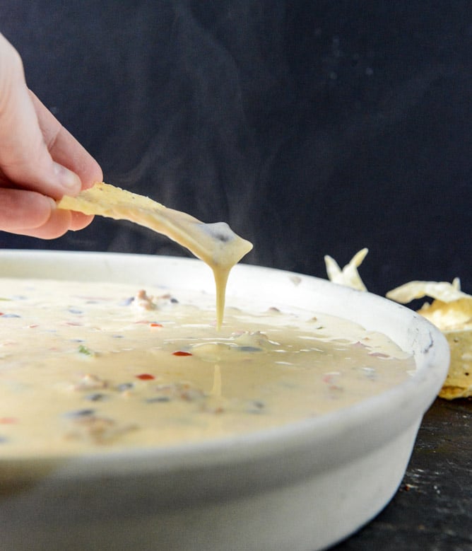 Spicy Beer Queso with Chorizo and Black Beans I howsweeteats.com Spicy Beer Queso with Chorizo and Black Beans I howsweeteats.com