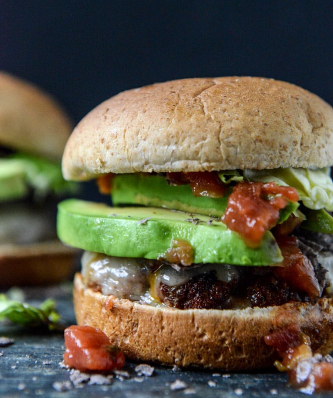 Taco-Rubbed Burgers with Avocado and Crushed Tortilla Chips I howsweeteats.com Taco-Rubbed Burgers with Avocado and Crushed Tortilla Chips I howsweeteats.com