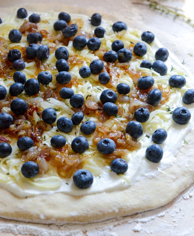 Blueberry Pizza with Whipped Ricotta + Caramelized Shallots I howsweeteats.com Blueberry Pizza with Whipped Ricotta + Caramelized Shallots I howsweeteats.com