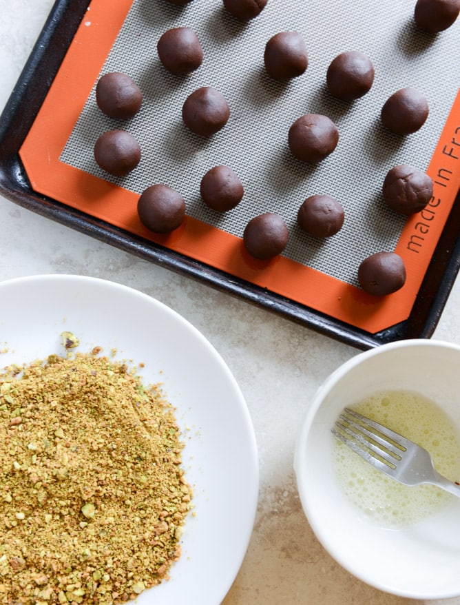 Chocolate Fudge Pistachio Thumbprints I howsweeteats.com Chocolate Fudge Pistachio Thumbprints I howsweeteats.com