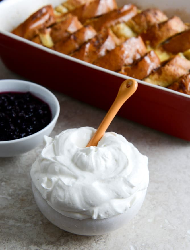 Cinnamon Sugar Sourdough French Toast Bake with Whipped Yogurt Topping I howsweeteats.com Cinnamon Sugar Sourdough French Toast Bake with Whipped Yogurt Topping I howsweeteats.com