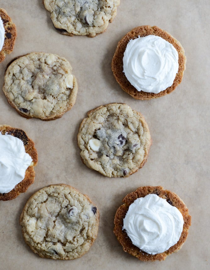 Chewy Black + White Chip Oatmeal Sandwich Cookies with Marshmallow Buttercream Filling I howsweeteats.com Chewy Black + White Chip Oatmeal Sandwich Cookies with Marshmallow Buttercream Filling I howsweeteats.com