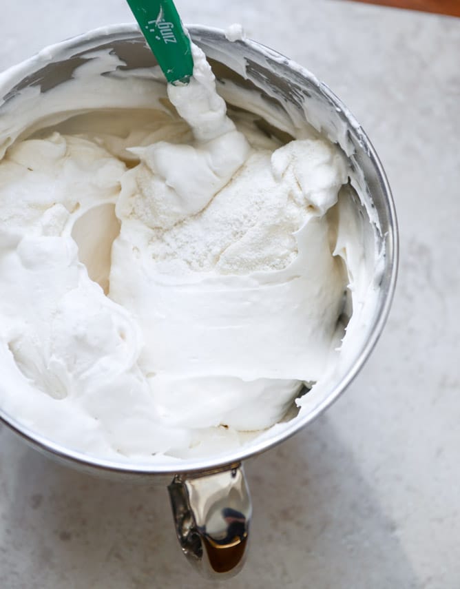 Angel Food Layer Cake with Whipped Coconut Cream and Grapefruit Syrup I howsweeteats.com Angel Food Layer Cake with Whipped Coconut Cream and Grapefruit Syrup I howsweeteats.com