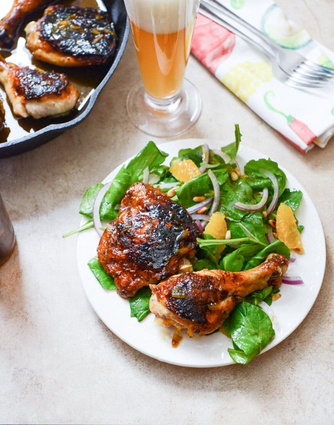Beer Glazed Citrus Chicken with Orange Arugula Greens I howsweeteats.com Beer Glazed Citrus Chicken with Orange Arugula Greens I howsweeteats.com