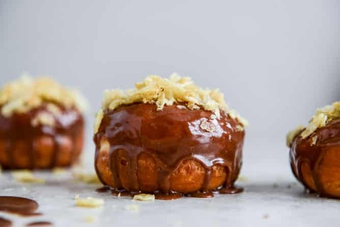 Crunchy Kettle Chip Chocolate Frosted Raised Donuts I howsweeteats.com Crunchy Kettle Chip Chocolate Frosted Raised Donuts I howsweeteats.com