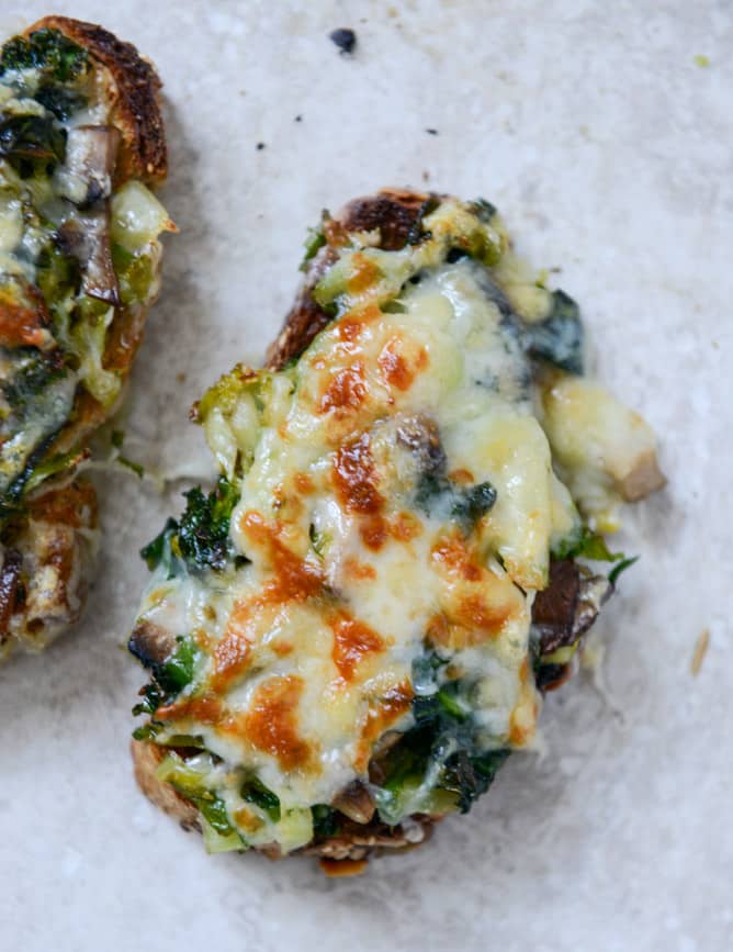 Broiled Fontina Toasts with Roasted Garlic and Poached Eggs I howsweeteats.com Broiled Fontina Toasts with Roasted Garlic and Poached Eggs I howsweeteats.com