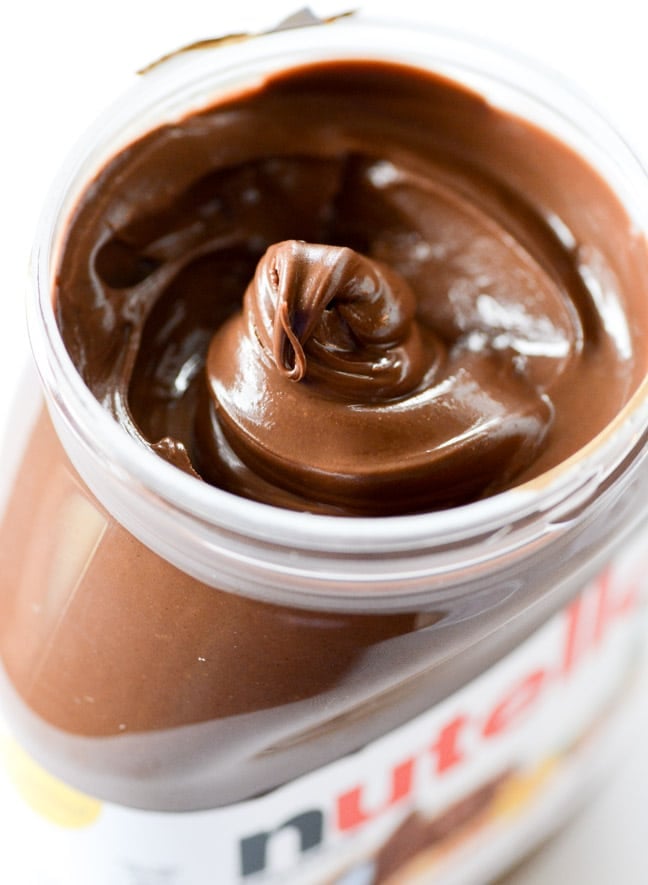 carrot cake cake with nutella swirled cream cheese frosting I howsweeteats.com