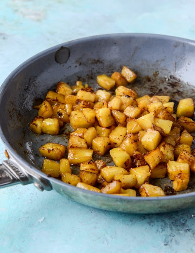 caramelized pineapple, bacon and goat cheese guacamole I howsweeteats.com