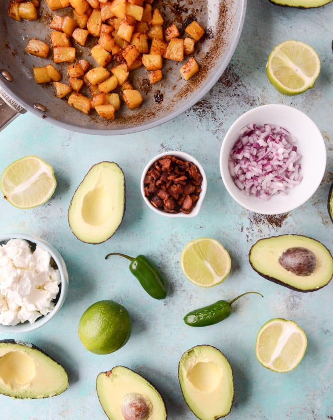 caramelized pineapple, bacon and goat cheese guacamole I howsweeteats.com