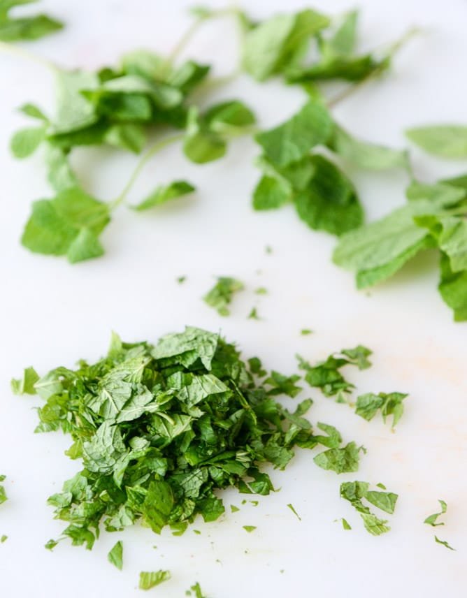 strawberry mango mint julep fruit salad with whipped marshmallow I howsweeteats.com