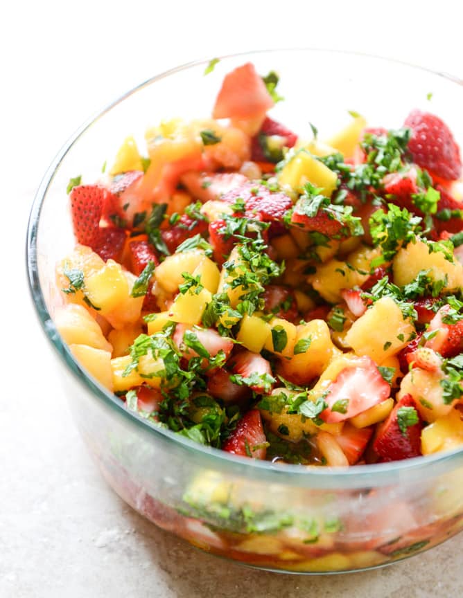 strawberry mango mint julep fruit salad with whipped marshmallow I howsweeteats.com