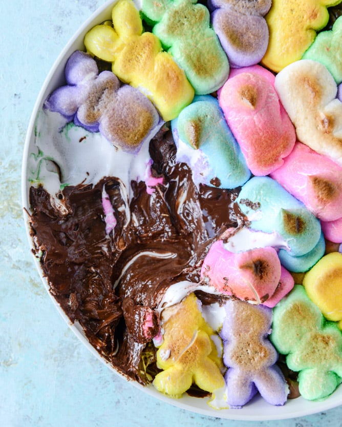 Peeps skillet s'mores! Indoor chocolate peanut butter s'mores using Peeps marshmallows make for the cutest spring treat! Best for using up those Peeps! I howsweeteats.com #peeps #smores