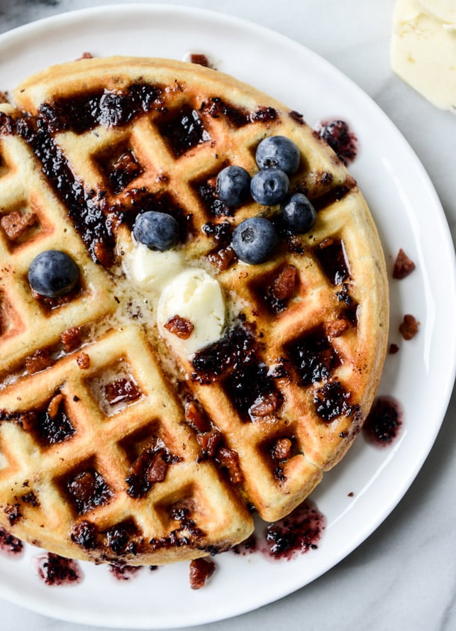 crispy bacon waffles with bourbon butter + blueberry syrup I howsweeteats.com