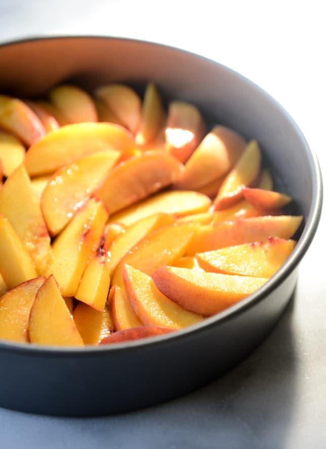 cinnamon sugar bourbon peach upside down cake I howsweeteats.com