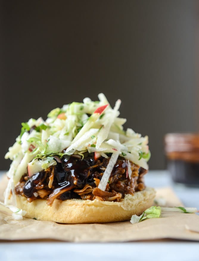 saucy chicken sandwiches with pomegranate bbq sauce and crunchy apple slaw I howsweeteats.com