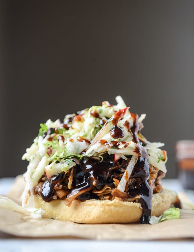 saucy chicken sandwiches with pomegranate bbq sauce and crunchy apple slaw I howsweeteats.com