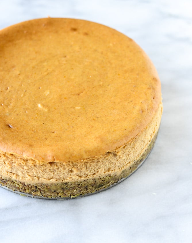 brown sugar pumpkin cheesecake with pistachio macaroon crust I howsweeteats.com