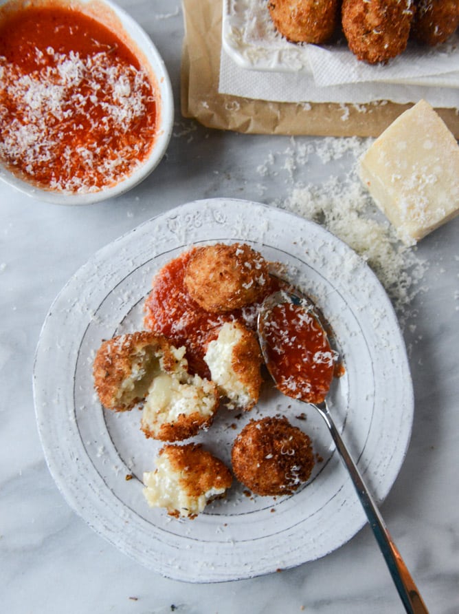 fontina, roasted garlic and goat cheese arancini I howsweeteats.com