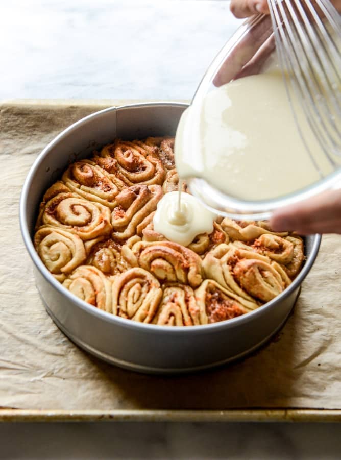 carrot cake cinnamon rolls with mascarpone icing I howsweeteats.com