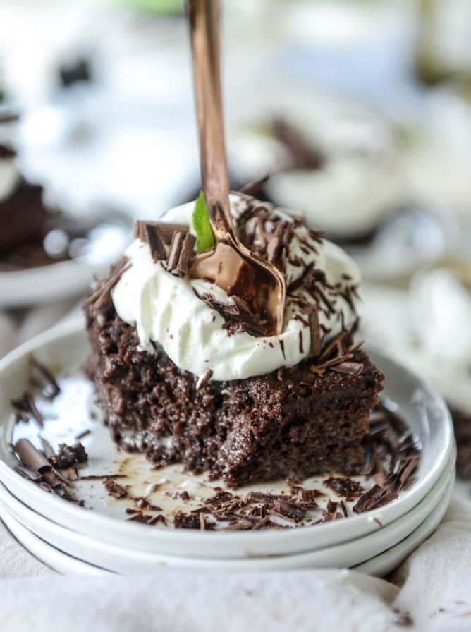 This chocolate tres leches cake is a spin on the classic tres leches. Three milks, one being chocolate milk, soak into the fudgiest cake ever! I howsweeteats.com