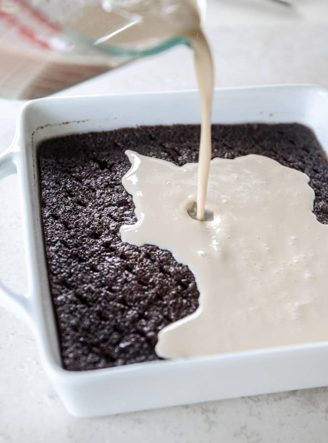 This chocolate tres leches cake is a spin on the classic tres leches. Three milks, one being chocolate milk, soak into the fudgiest cake ever! I howsweeteats.com