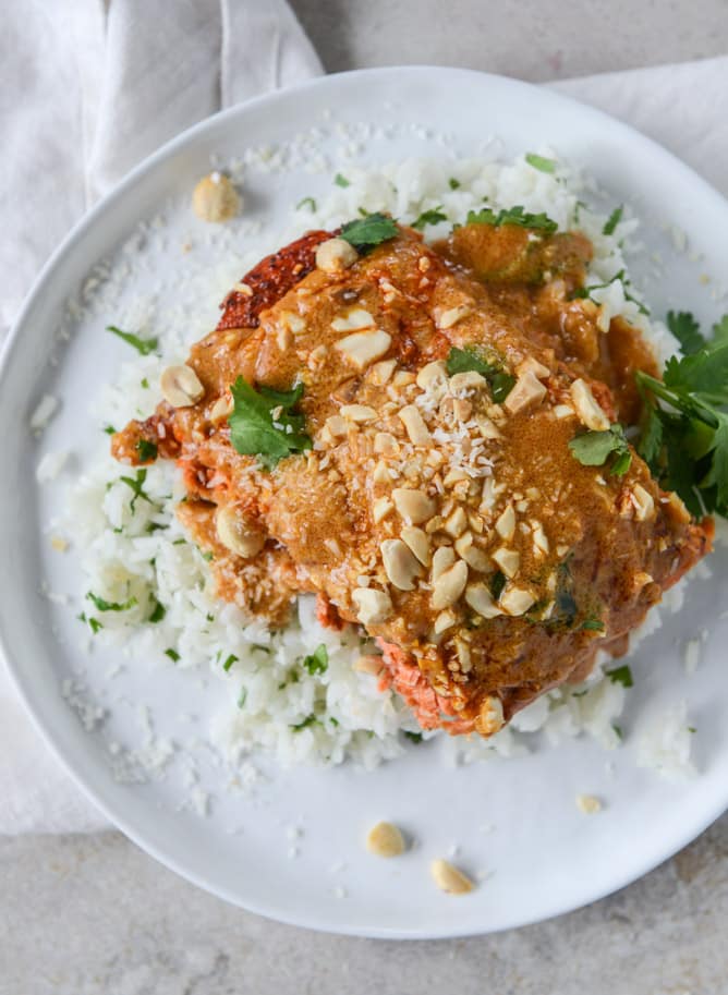 salmon with thai curry peanut sauce and coconut cilantro rice I howsweeteats.com