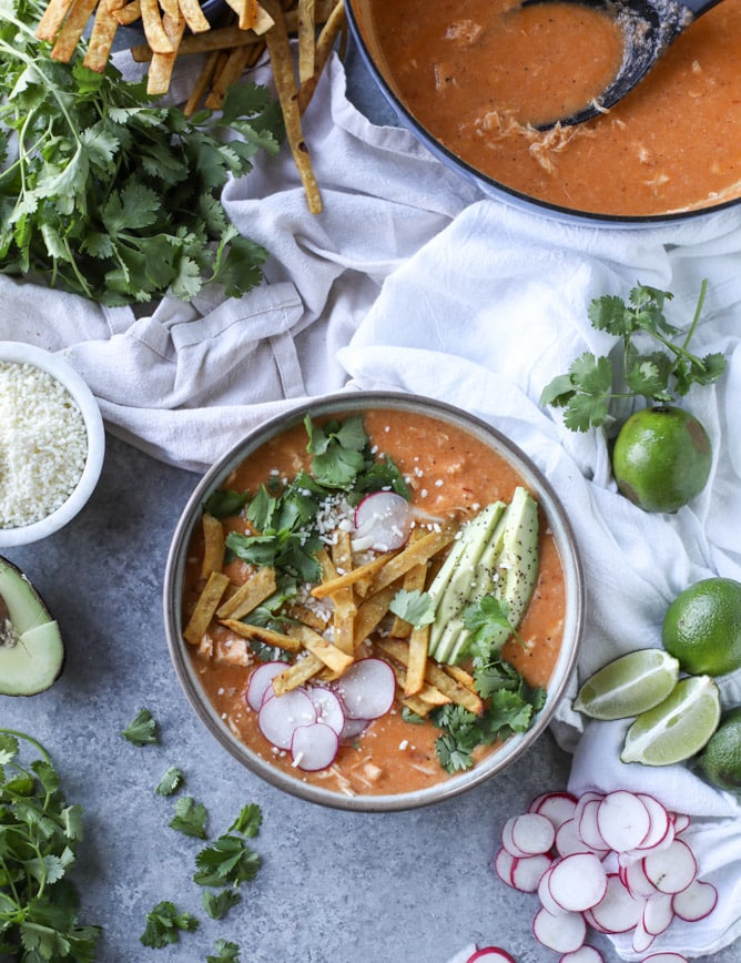 cheesy turkey (or chicken!!) tortilla soup with crispy tortilla strips I howsweeteats.com