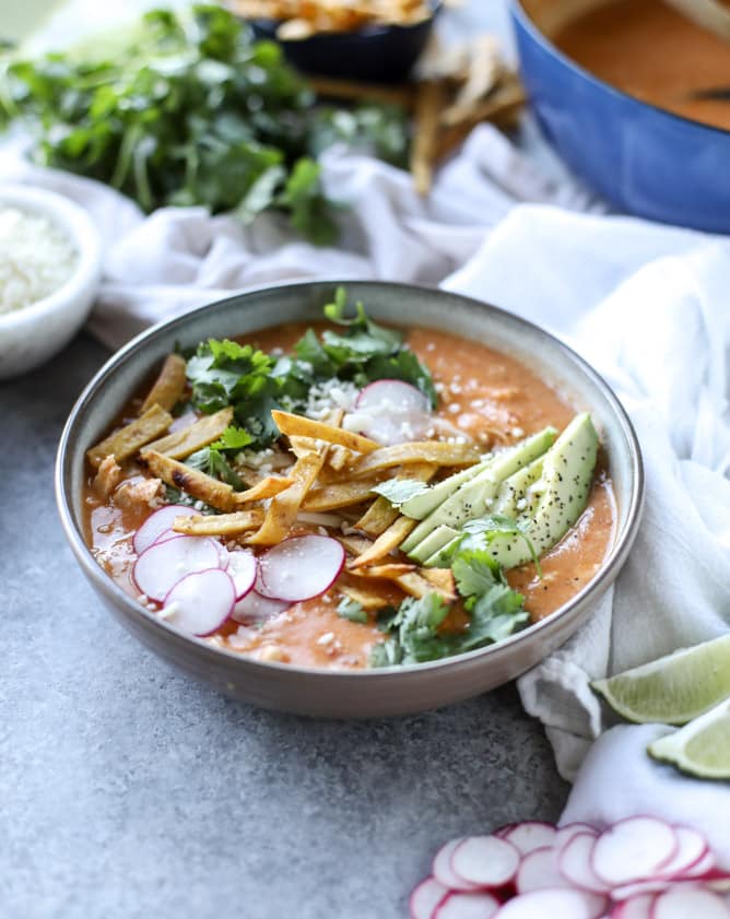 cheesy turkey (or chicken!!) tortilla soup with crispy tortilla strips I howsweeteats.com