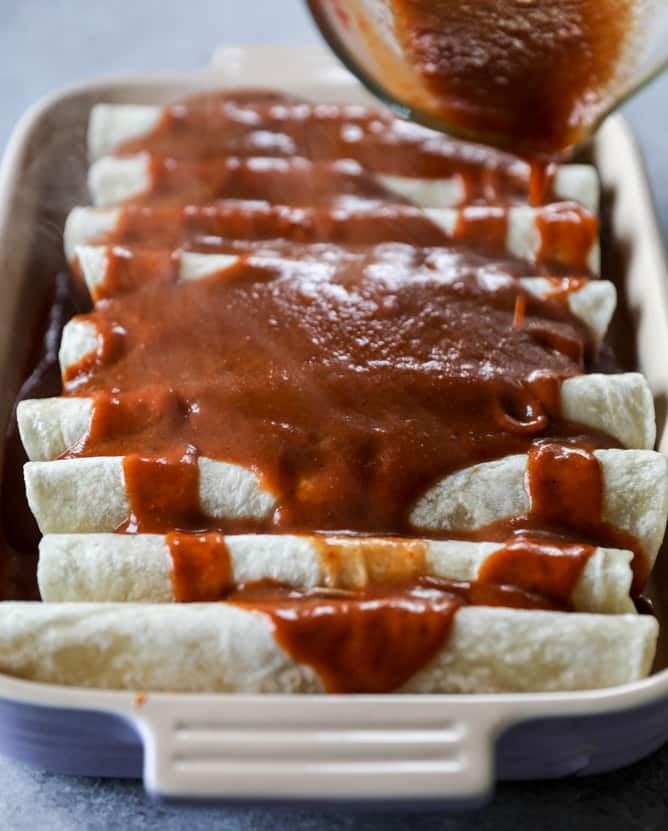 cheesy pork enchiladas with 10 minutes smoky enchilada sauce I howsweeteats.com