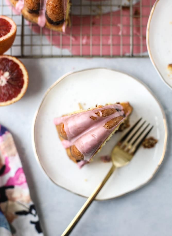 This blood orange coffee cake is made with greek yogurt and the most delicious blood orange glaze! Perfect for a winter breakfast or brunch! I howsweeteats.com #bloodorange #coffeecake