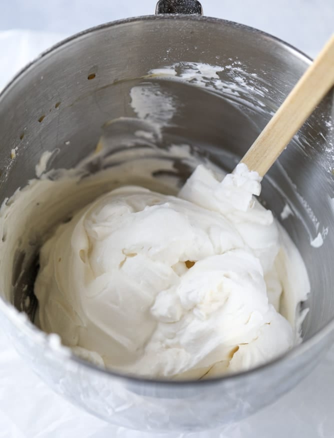 coconut custard pie with coconut whipped cream I howsweeteats.com