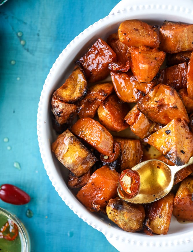 hot honey caramel sweet potatoes I howsweeteats.com #thanksgiving #sweetpotatoes #recipes