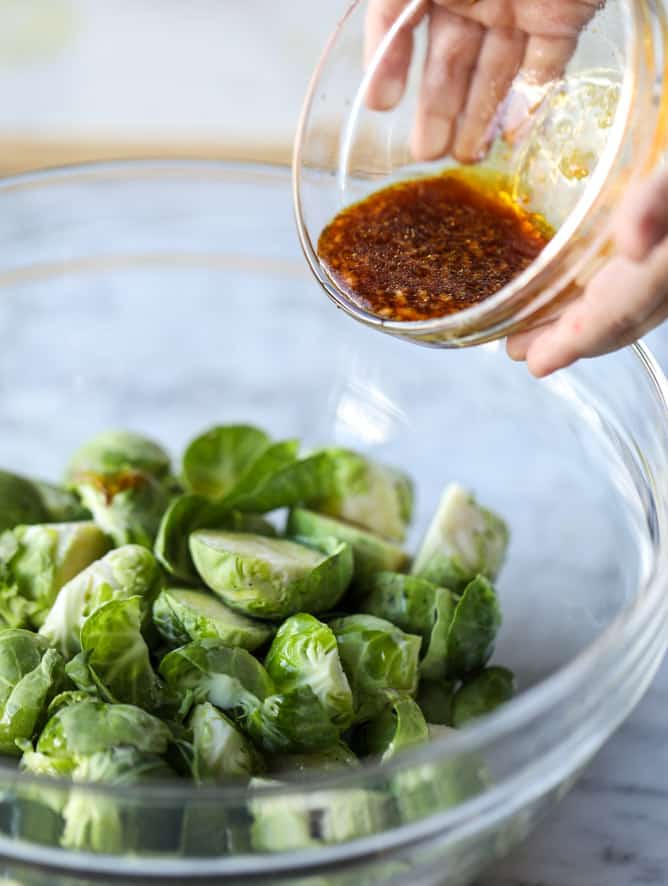 sheet pan honey garlic salmon and brussels I howsweeteats.com #sheetpan #salmon #honeygarlic #brusselssprouts