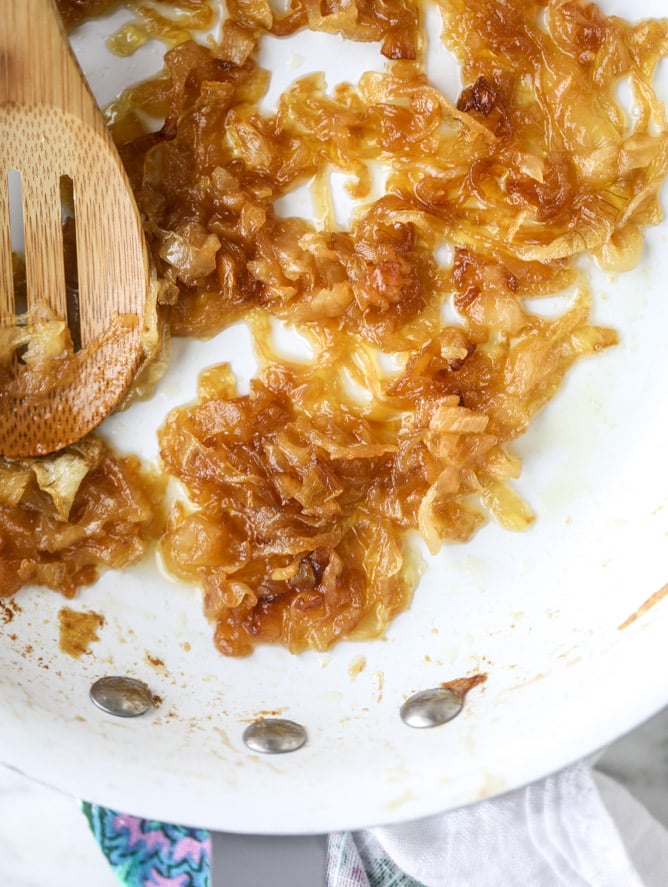french onion grilled cheese with thyme butter I howsweeteats.com #grilledcheese #caramelizedonion #vegetarian