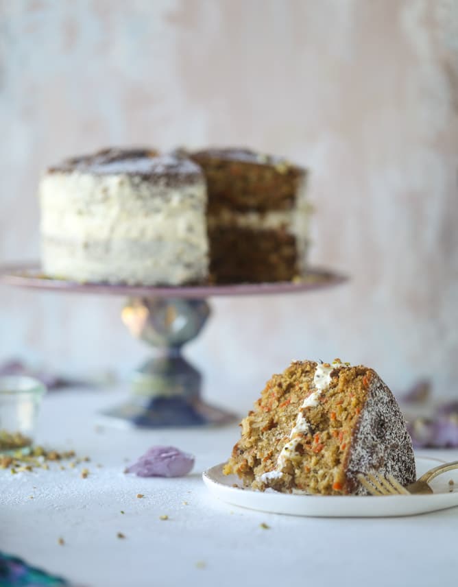 pistachio carrot cake with cream cheese frosting I howsweeteats.com #carrotcake #pistachio #cake #creamcheese #frosting