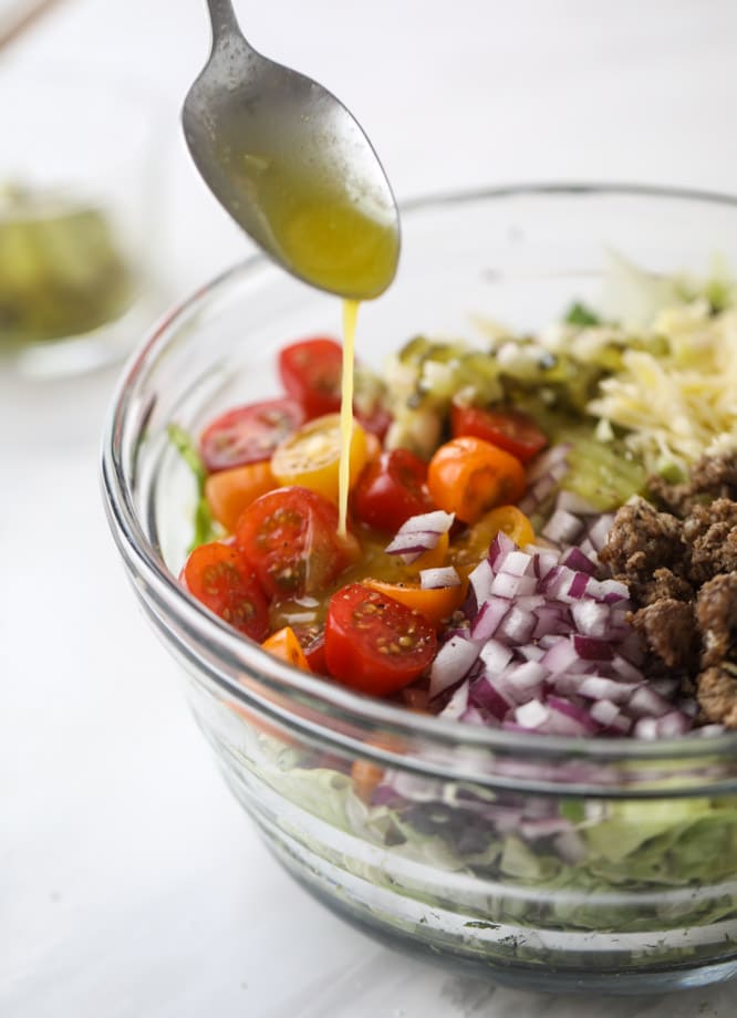 cheeseburger chopped salad I howsweeteats.com #cheeseburger #chopped #salad #dill #pickle #dressing