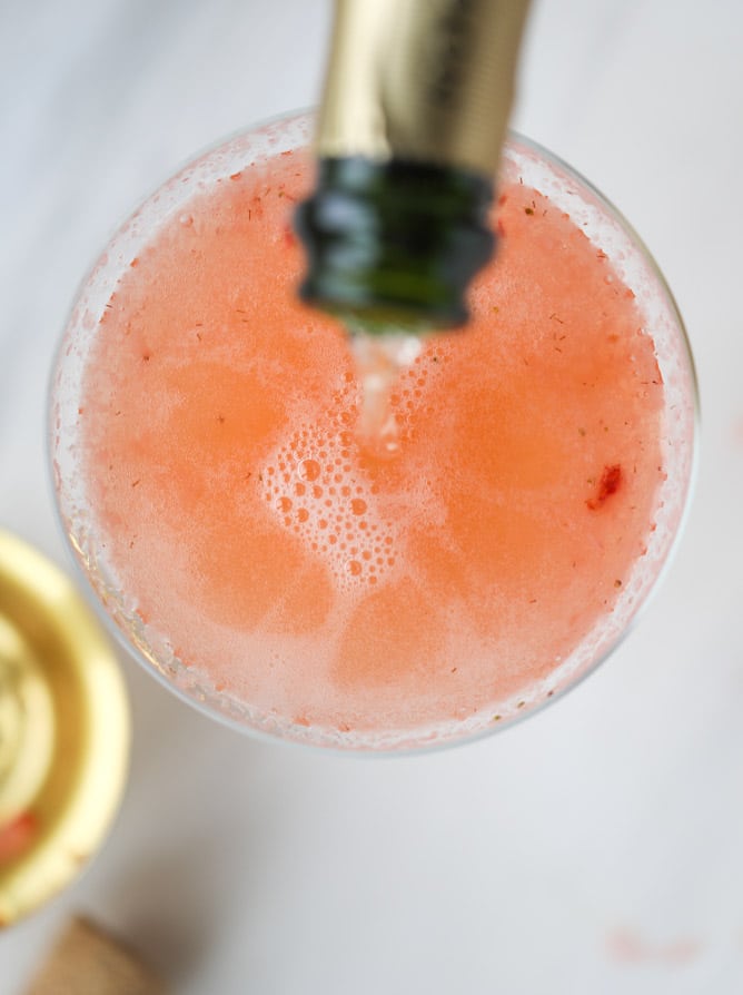 strawberry champagne tequila fizz I howsweeteats.com #strawberry #champagne #tequila #cocktail #jalapeno